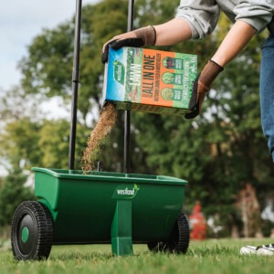 aftercut all in one autumn being poured into a spreader