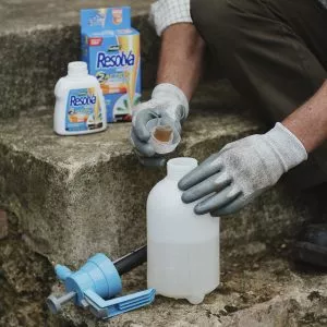 Resolva weedkiller 2 action concentrate being poured