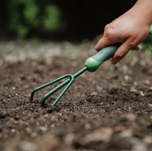 Gardener's Mate 3 Prong Hand Cultivator in use