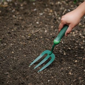 Gardener's Mate Hand Fork in use