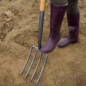 Kent & Stowe Carbon Steel Digging Fork in soil