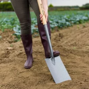 Kent & Stowe Carbon Steel Digging Spade digging up soil