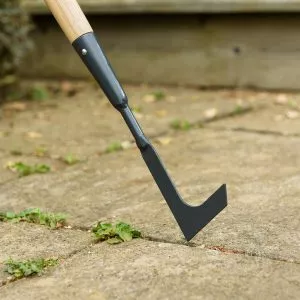 Kent & Stowe Carbon Steel Long Handled Weeding Knife in pavement