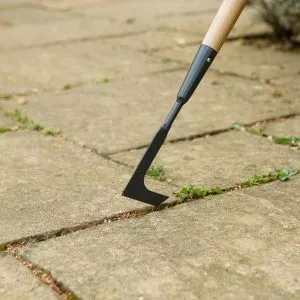 Kent & Stowe Carbon Steel Long Handled Weeding Knife in pavement