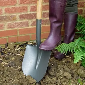 Kent & Stowe Carbon Steel Round Nose Shovel in soil