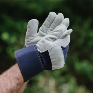 fleece lined rigger gloves being put on hands