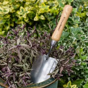 kent & stowe stainless steel hand trowel in use