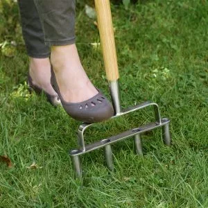 kent & stowe stainless steel lawn aerator in use