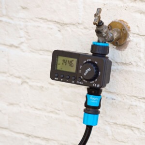 flopro digital timer attached to wall