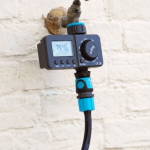 flopro digital timer attached to wall