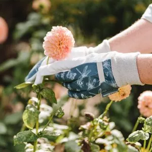 Teal Jersey Cotton Grip Gloves in use