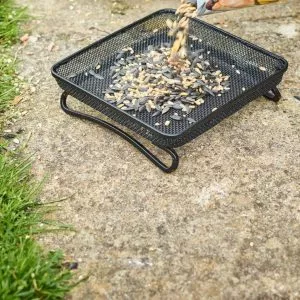 Gardman Compact Ground Feeder Tray on patio