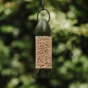 Peckish Complete Energy Bites ready to use filled feeder in tree