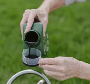 pouring liquid into cap