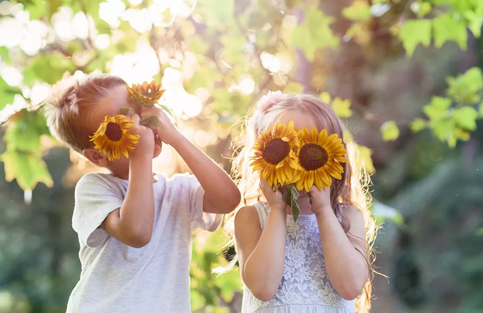 kids with sunflowers