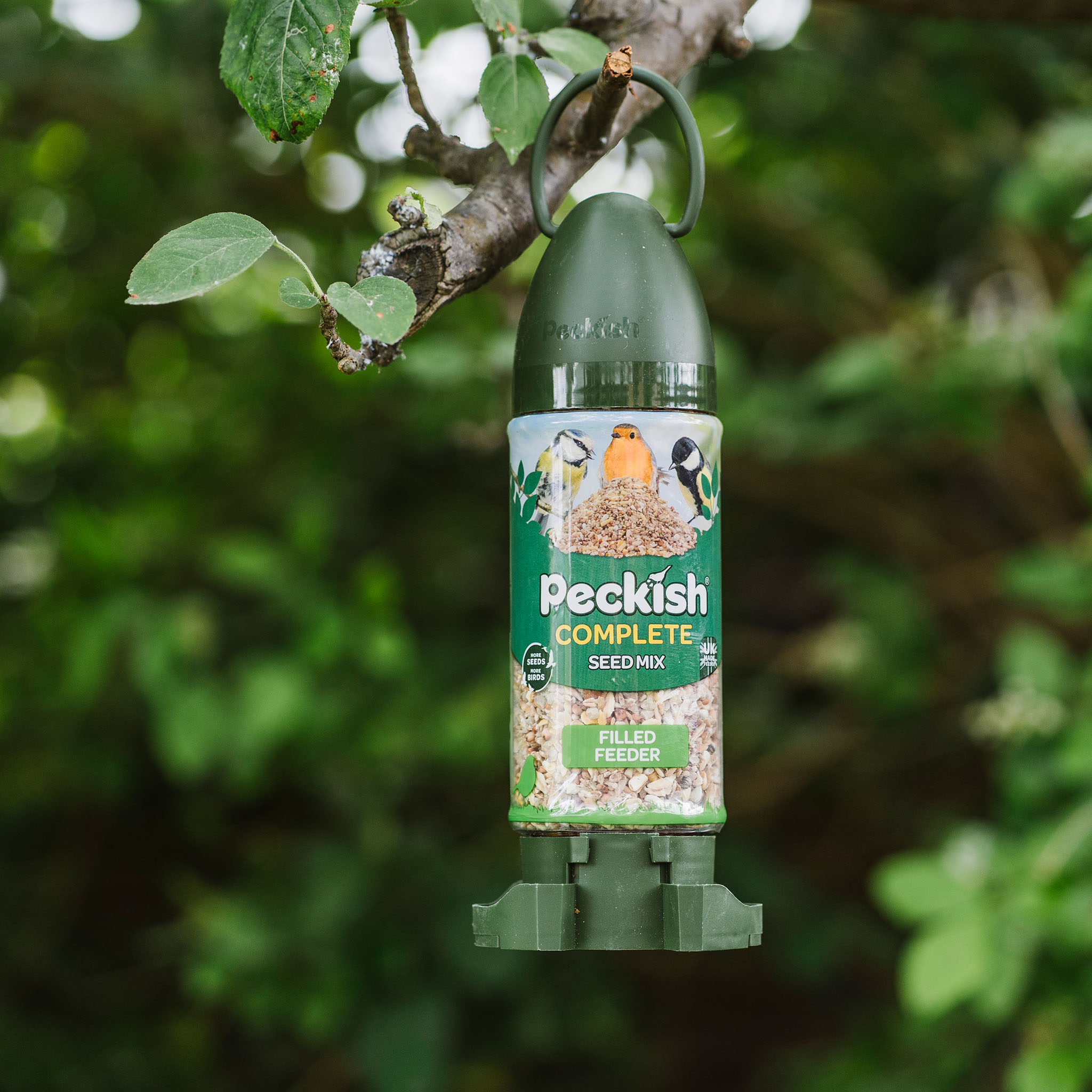 Peckish Complete Filled Feeder in packaging hanging in tree