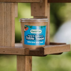 gardman seed & mealworm table topper on bird table